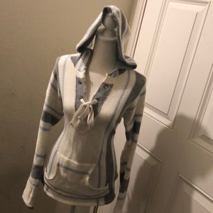 White, light blue, and grey sweater poncho